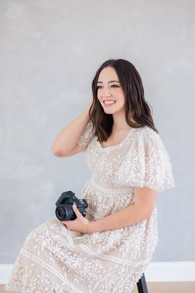 Hailey, owner of Hailey Marie Photo + Video